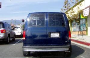 a blue van with dollar signs on the back windows